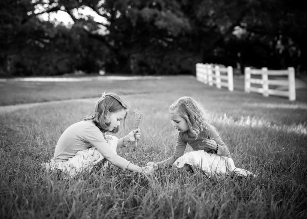 EMy & Lila picking flowers