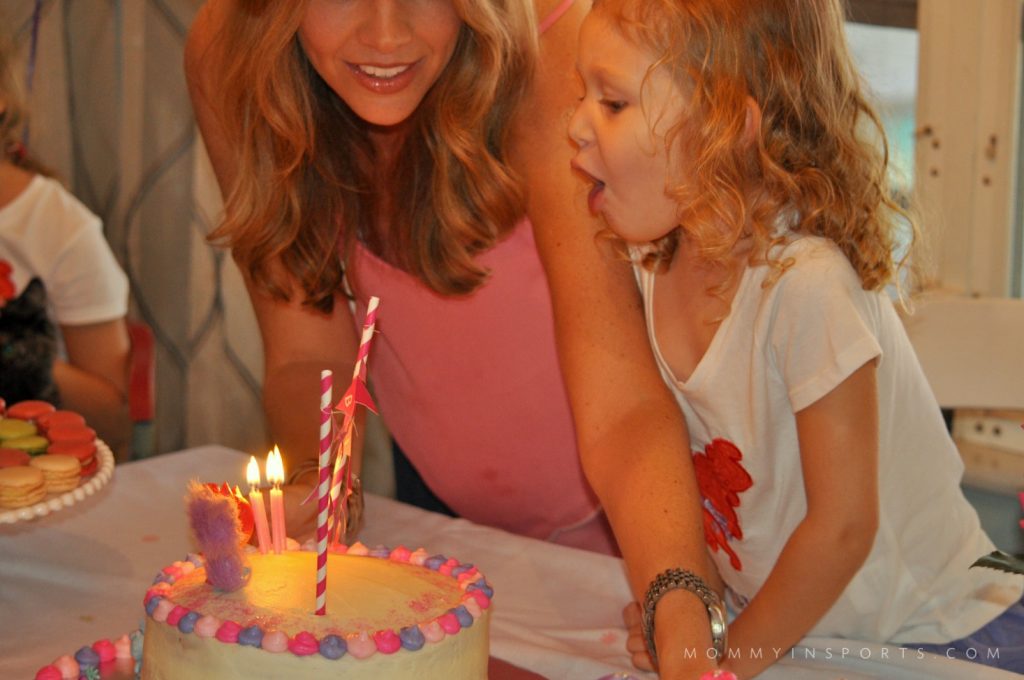 Emy Blowing out Candles