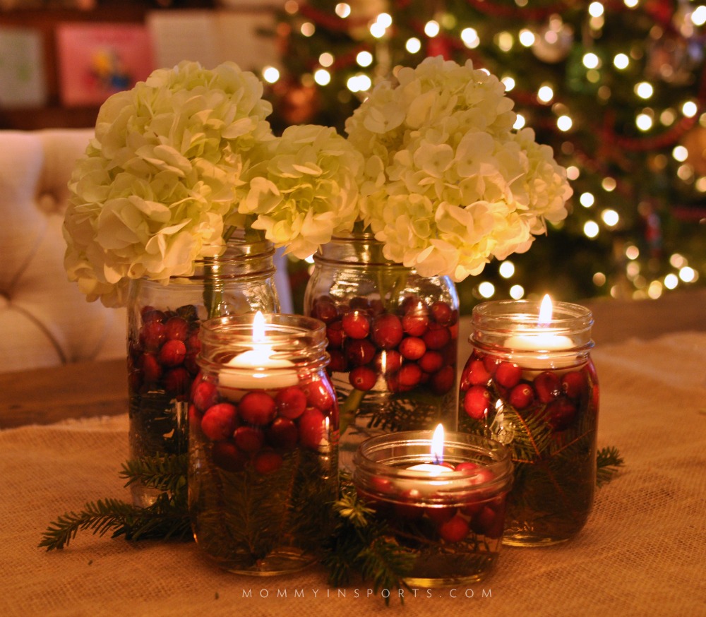 Mason Jars are perfect to use for a holiday centerpiece! Fill them with flowers, cranberries, evergreen clippings, or even pine cones for a beautiful DIY holiday centerpiece!